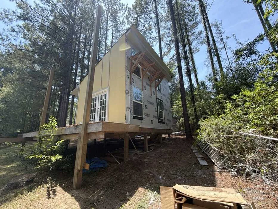 Detached building under construction, shared by PINEFORGE